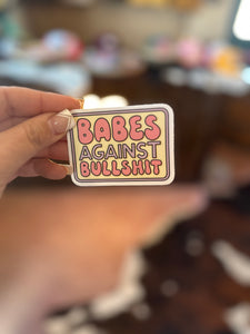 "babes against bullshit" slogan print sticker