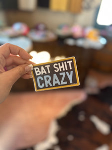 'bat shit crazy' slogan sticker design