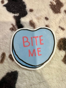 'Bite Me' slogan text heart shaped blue ticker